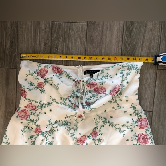 Eloquii|White chiffon floral halter jumpsuit with wide leg, open leg detail•••22 - Picture 16 of 17